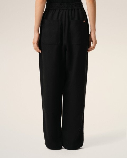 Штани AMI PARIS